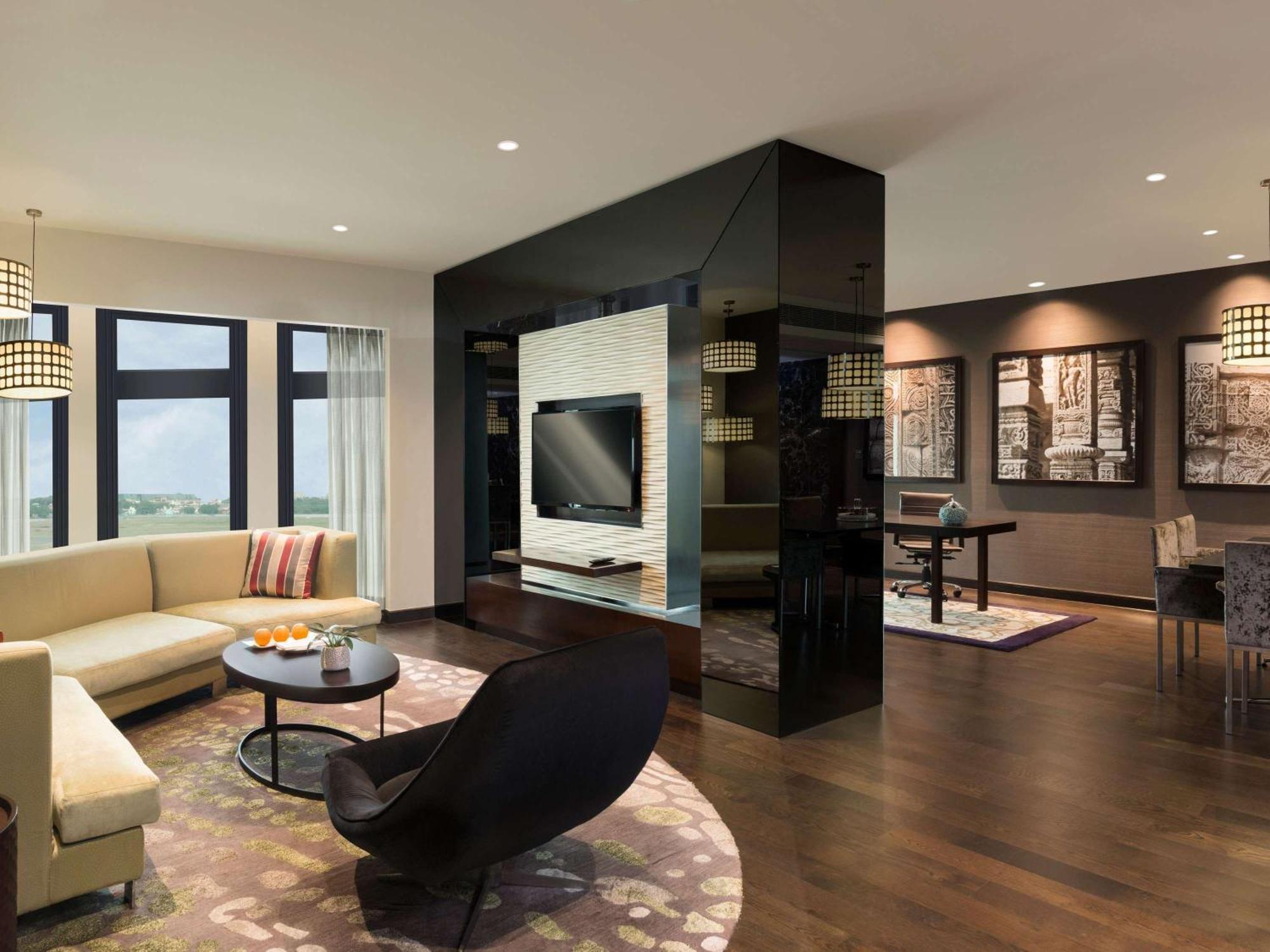 Pullman New Delhi Aerocity Exteriör bild A typical apartment interior